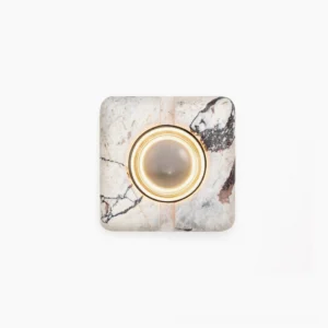 Rectilinear travertine wall lamp front view unlit showing natural stone veining and minimalist design