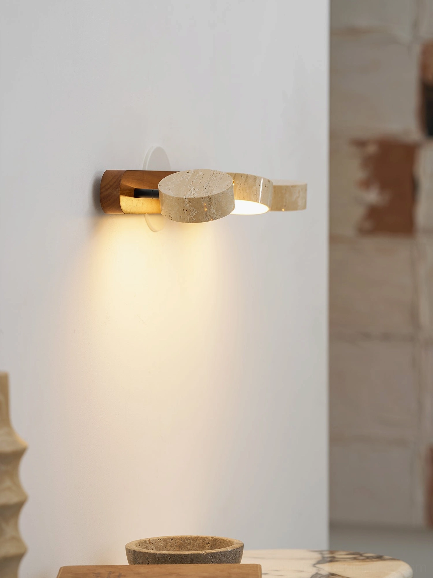 Mid-century modern travertine sconce gallery wall art display installation
