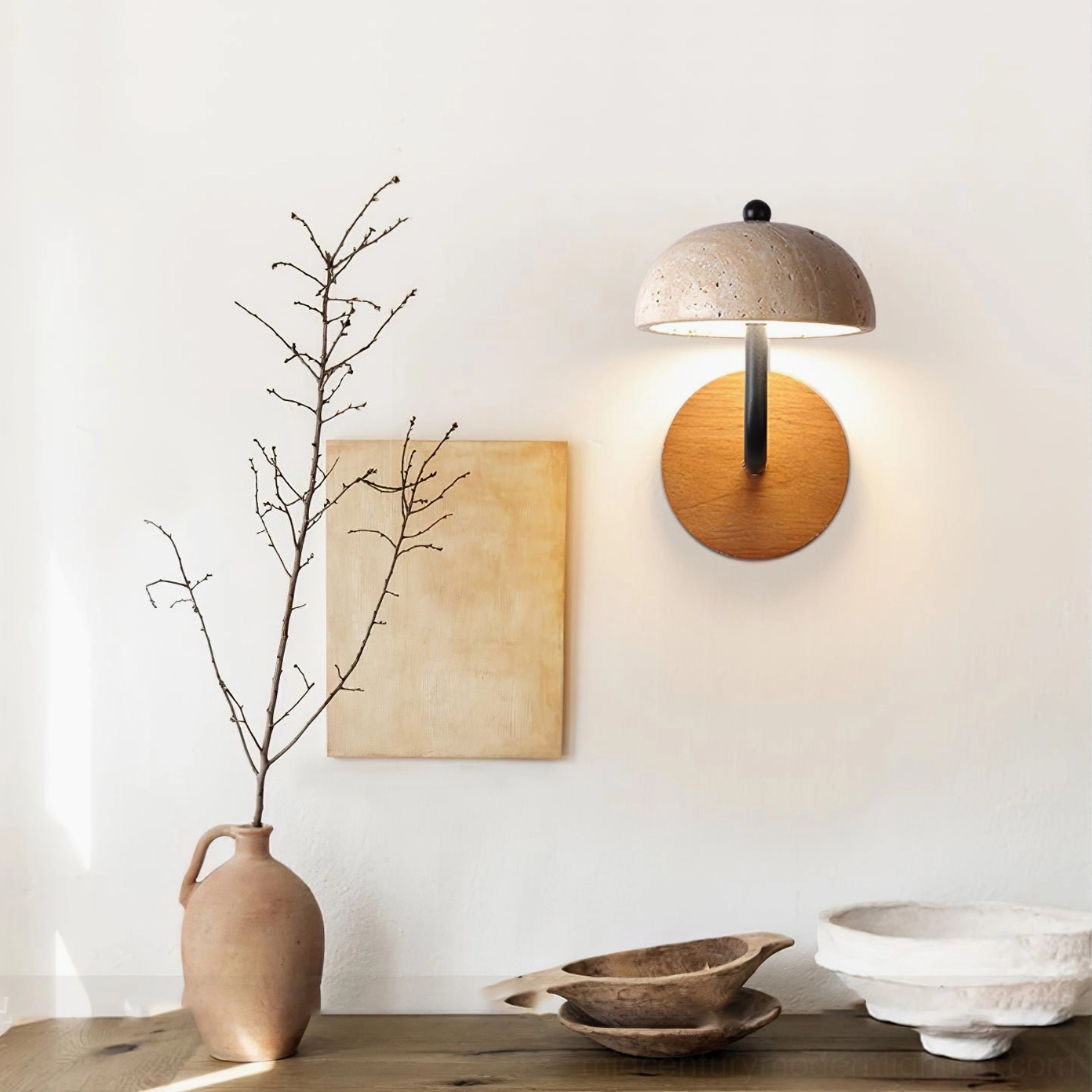 travertine wall lamp installed in minimalist wabi-sabi home decor corner setting