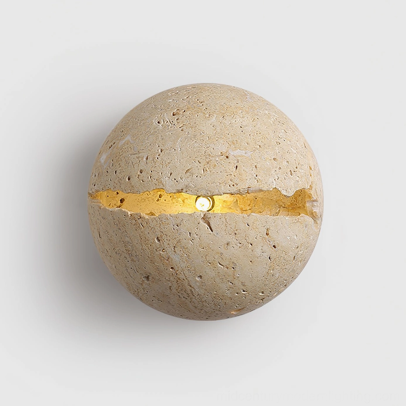Beige travertine round wall lamp with warm glow, frontal centered view showing porous stone texture and light slot
