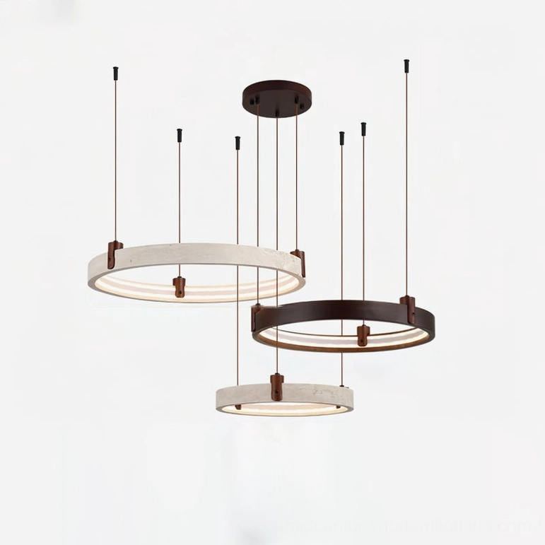 Sculptural travertine ring chandelier installation detail showing walnut wood accents and black metal framework