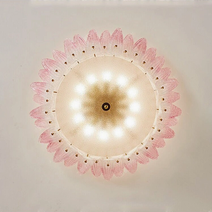 Treviso frosted glass ceiling light showing sculptural botanical crown silhouette against ceiling architectural elements