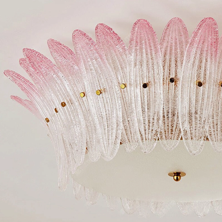 Treviso ceiling light installed above bed in luxury master suite showing jewelry-like presence and ambient glow