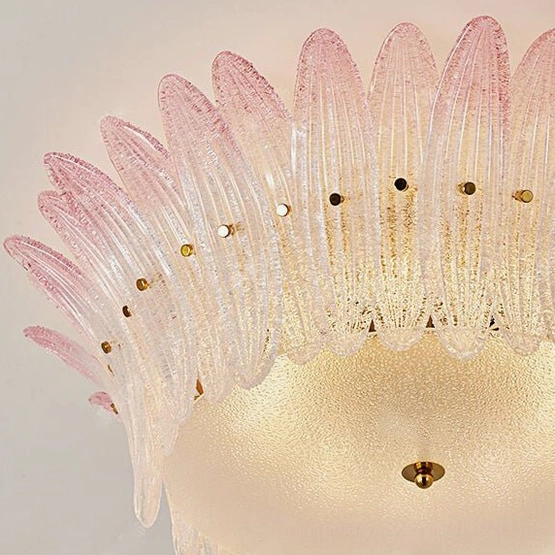 Treviso ceiling mount showing petal-shaped frosted glass design with matte white mounting hardware and minimalist aesthetic