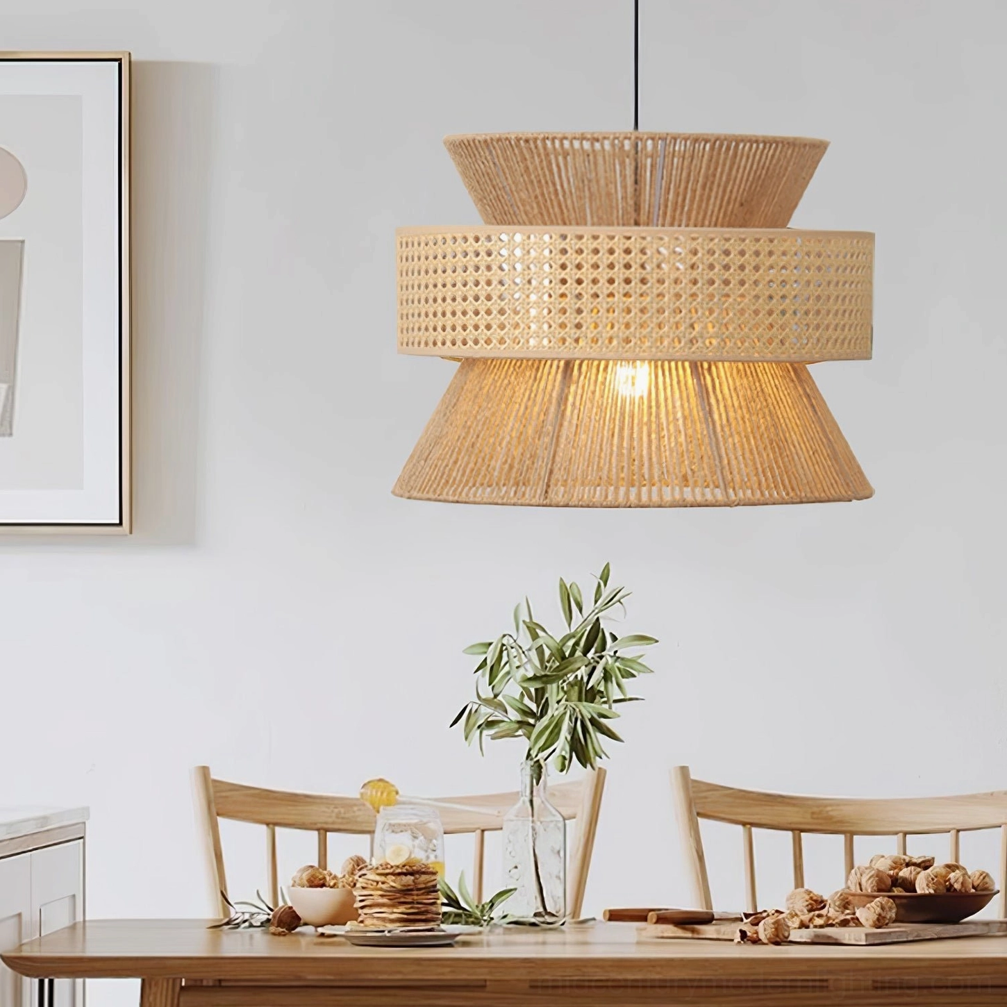 Tiered rattan pendant lamp with layered woven shade casting ambient warm lighting in modern dining room