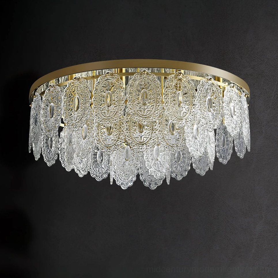 Unlit Trillion ceiling lamp close-up showing embossed carved crystal pendants and brushed gold metal frame
