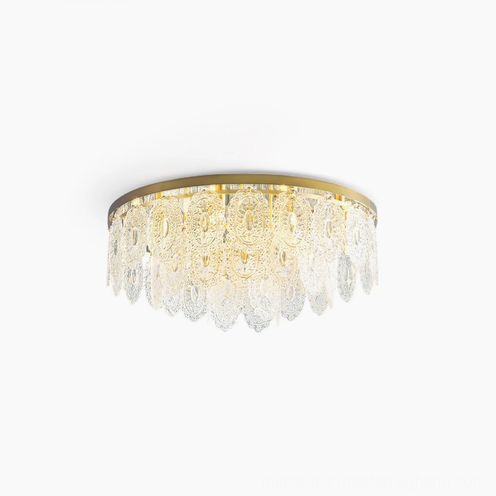 Trillion brass ceiling lamp illuminated with warm glowing crystal pendants, white background studio shot