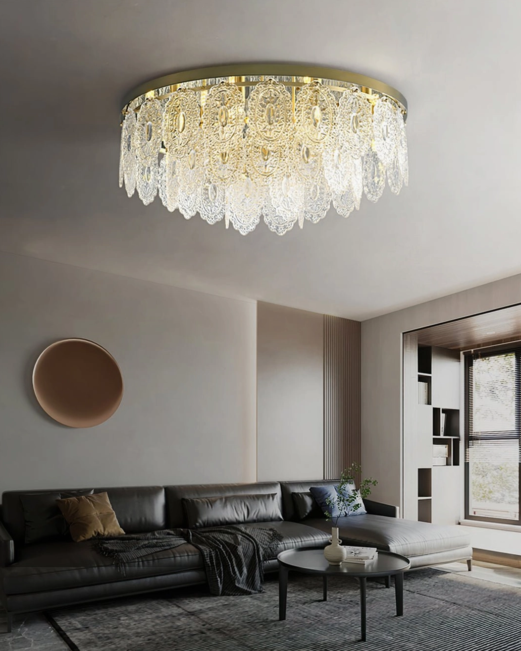 Unlit Trillion ceiling lamp with clear refractive crystal pendants and brushed gold finish in open-plan living room