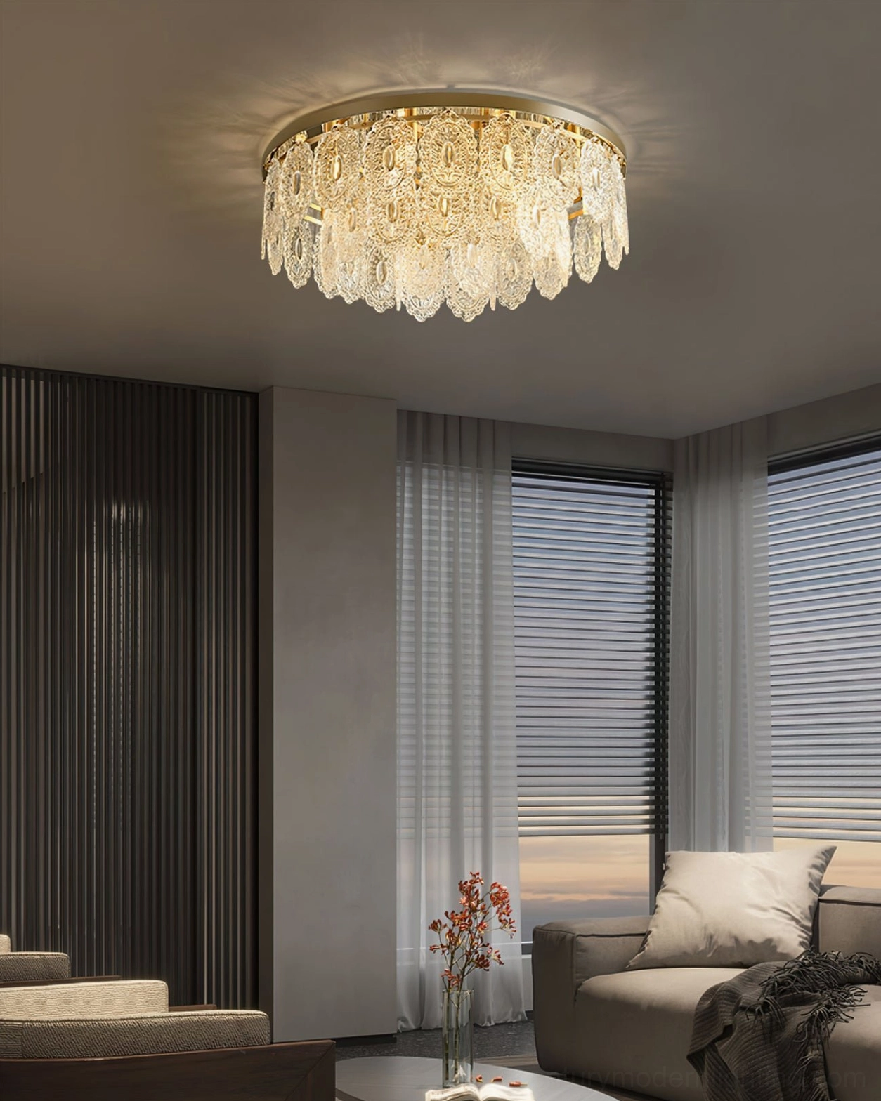 Lit Trillion crystal ceiling lamp in minimalist modern living room with neutral tones and window blinds