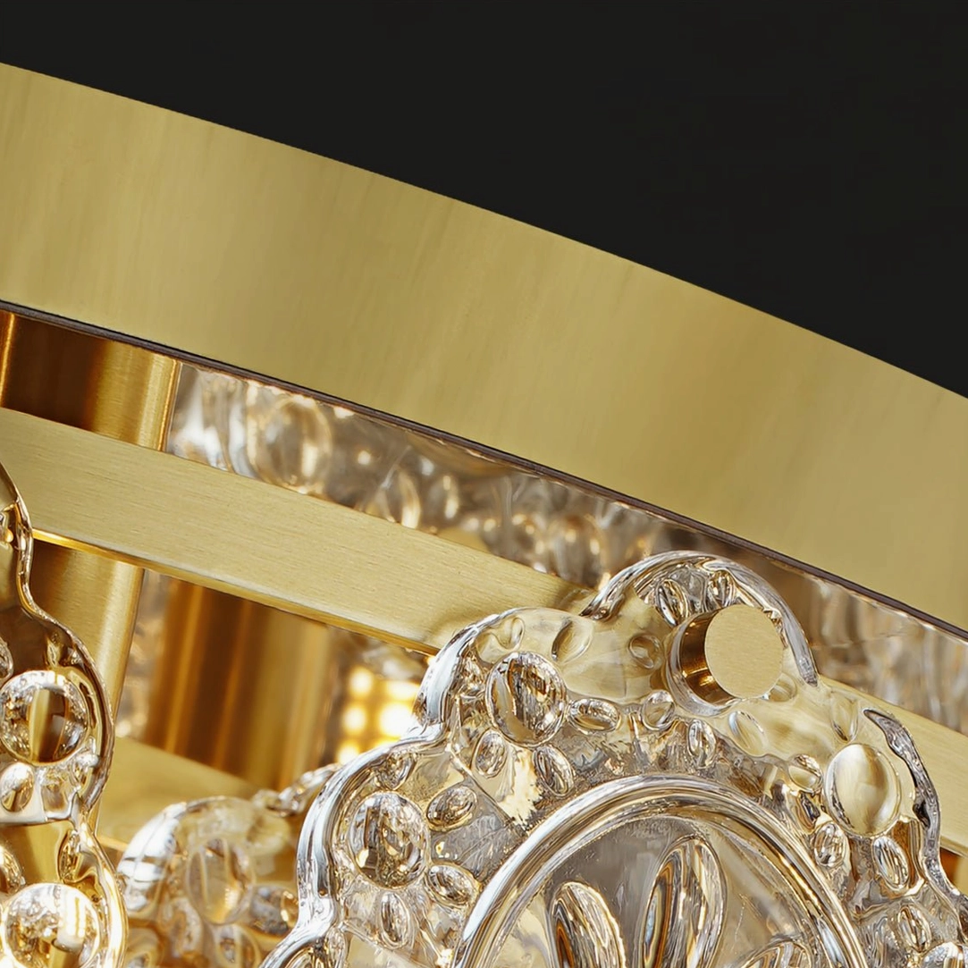 Close-up macro shot of Trillion ceiling lamp hardware showing brushed gold metal frame construction