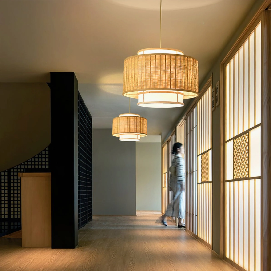 Twin Trinidad rattan pendant lamps in Japanese hallway with shoji screens and minimalist ambiance