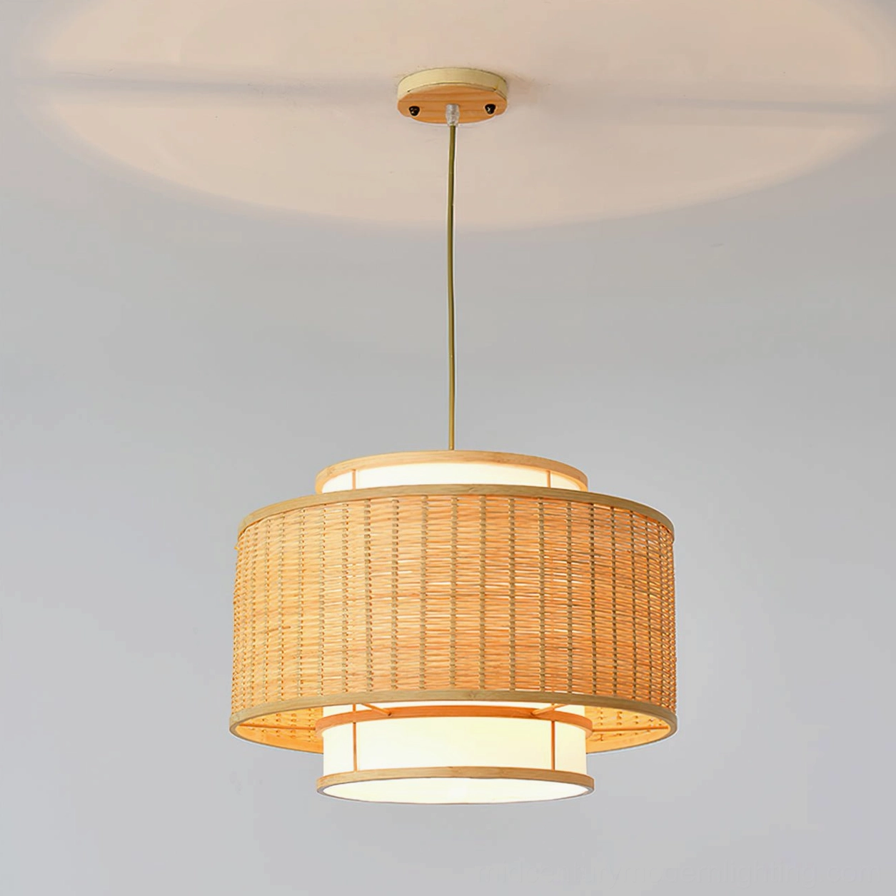 Trinidad bamboo rattan pendant light three-quarter angle view showing layered weave construction