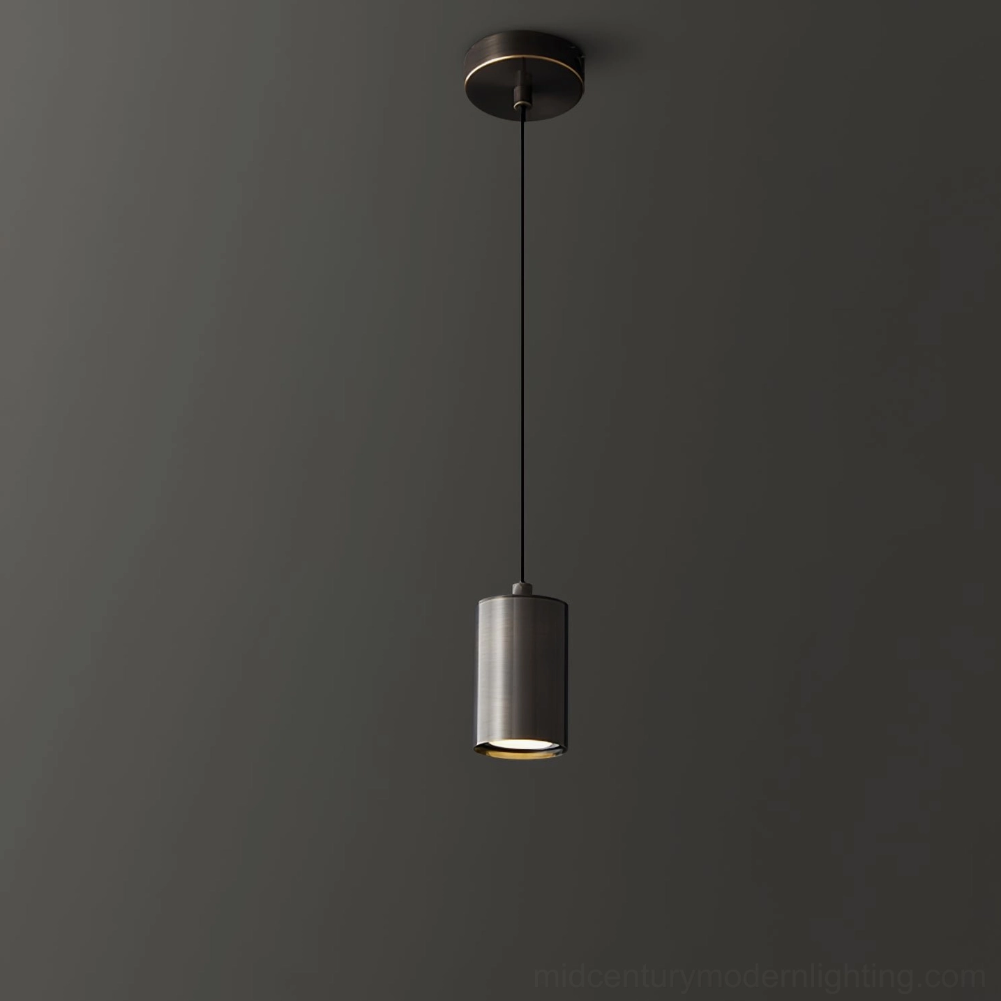 Matte dark grey trio cylindrical pendant lamp - frontal hanging view studio background