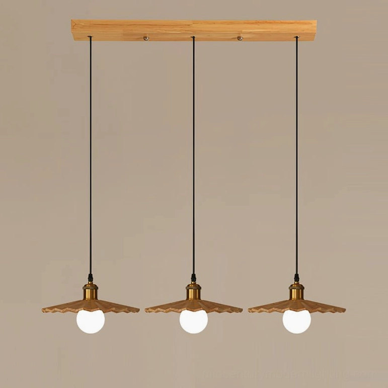 Three geometric natural wood pendant lights in open installation showing spacing and visual impact - 3-light natural finish
