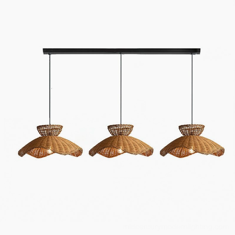 Triple rattan pendant lights arrangement, studio view demonstrating multi-pendant linear configuration for dining areas