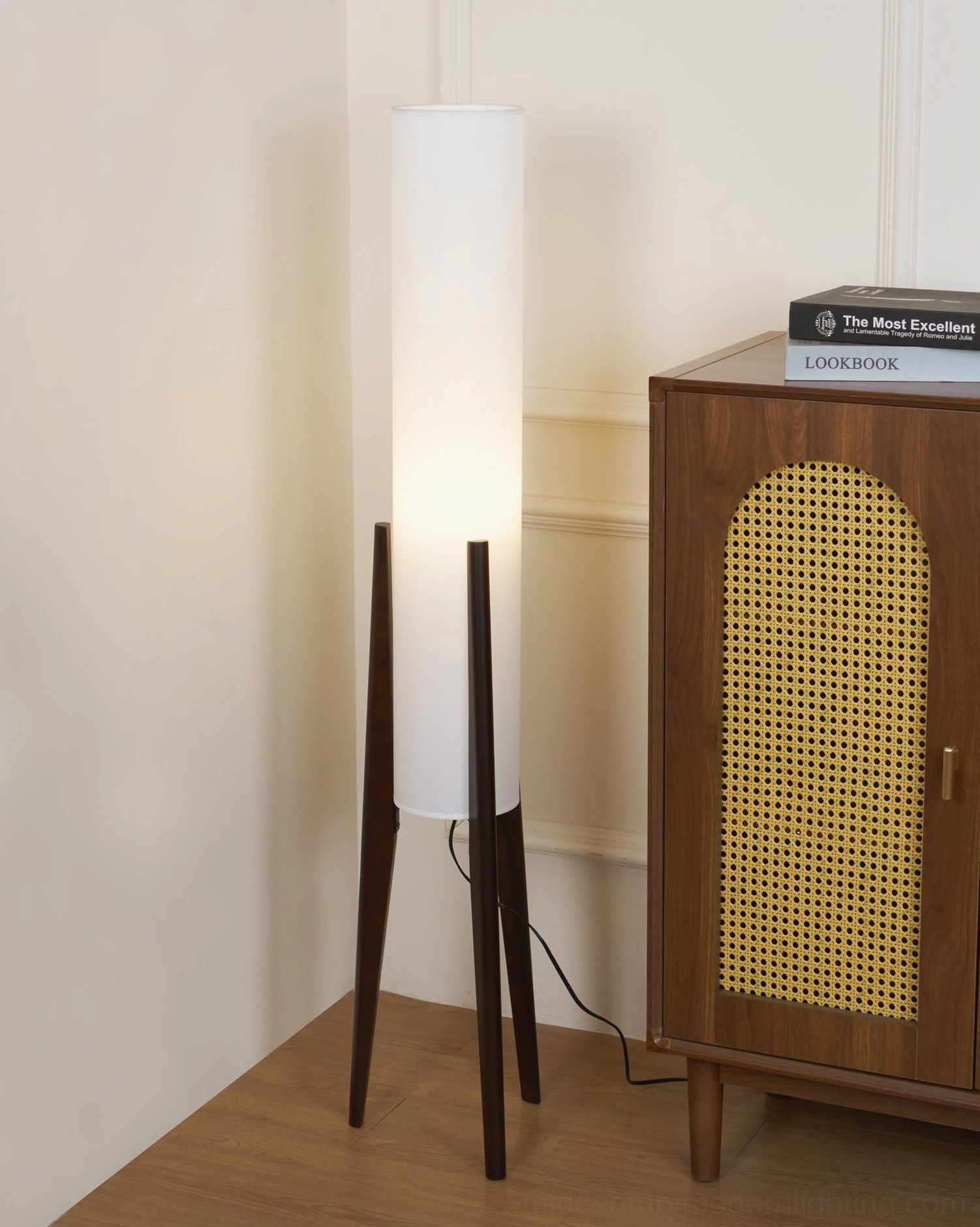 Walnut and white modern tripod floor lamp base detail showing three-legged stand construction
