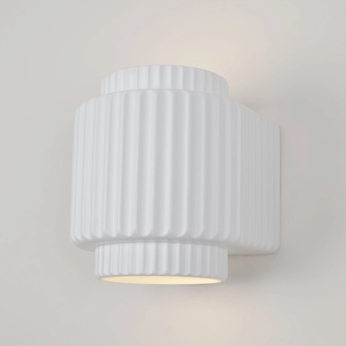 Tristan Nordic wall sconce left perspective showing bottom light opening and wall-mounted installation design