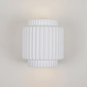Tristan mid-century modern wall lamp showcasing symmetrical two-tiered shape with full vertical fluting details