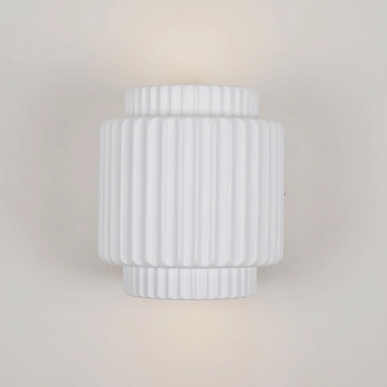 Tristan mid-century modern wall lamp showcasing symmetrical two-tiered shape with full vertical fluting details