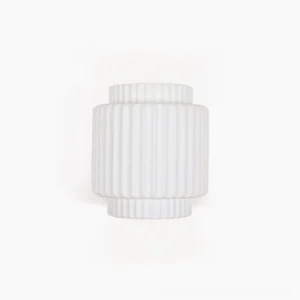 Tristan fluted white wall sconce with vertical ribbed texture and dual-tiered minimalist design on clean background