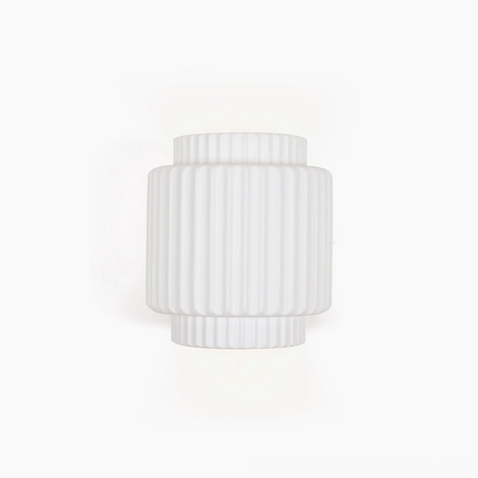 Tristan fluted white wall sconce with vertical ribbed texture and dual-tiered minimalist design on clean background
