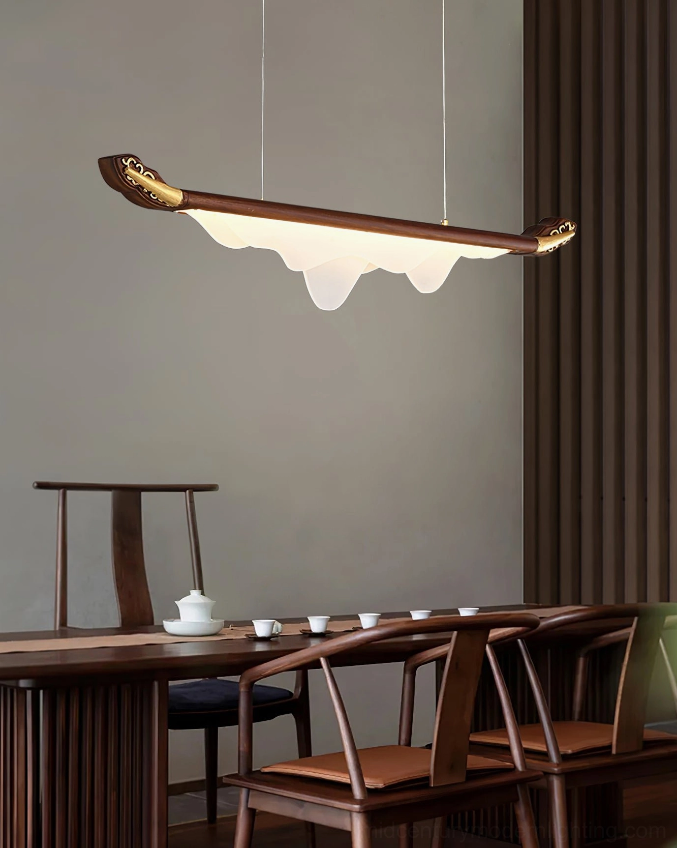 Troag linear pendant fixture in contemporary interior space, mid-century modern aesthetic