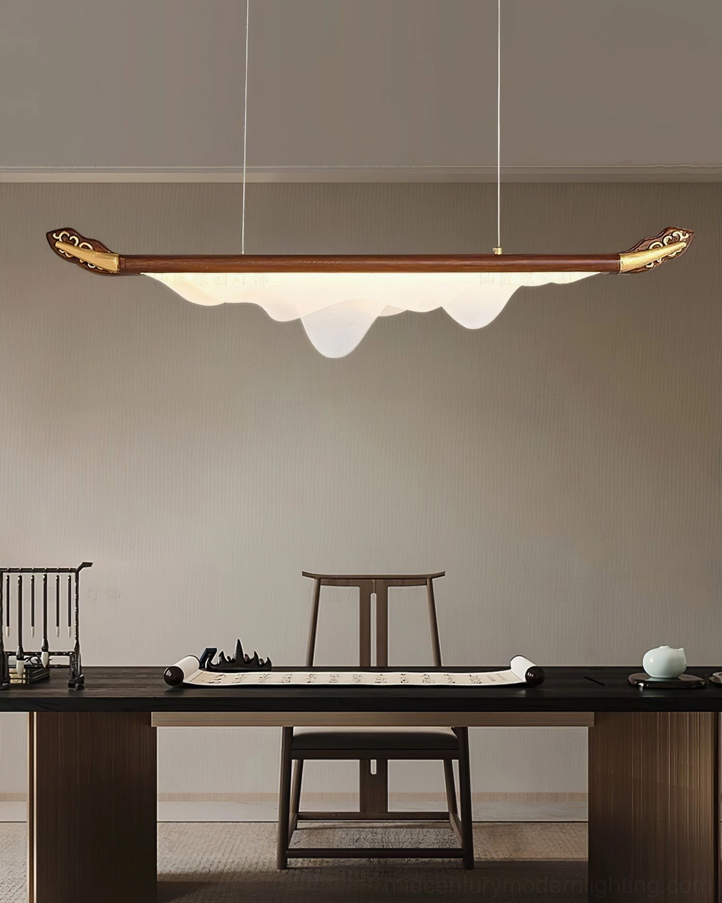 Troag pendant light in minimalist study space above dark wood desk with traditional seating