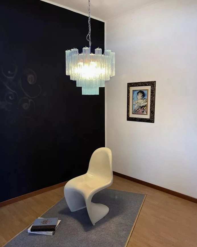 Contemporary tiered glass tube chandelier with sophisticated architectural light diffusion, modern pendant lighting