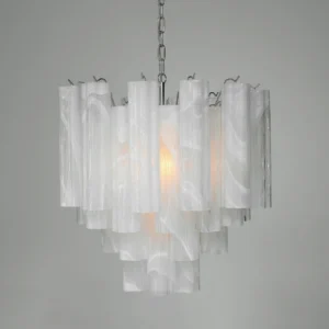Modern tiered glass chandelier with layered white frosted tubes and polished silver hardware, overhead view with warm illumination