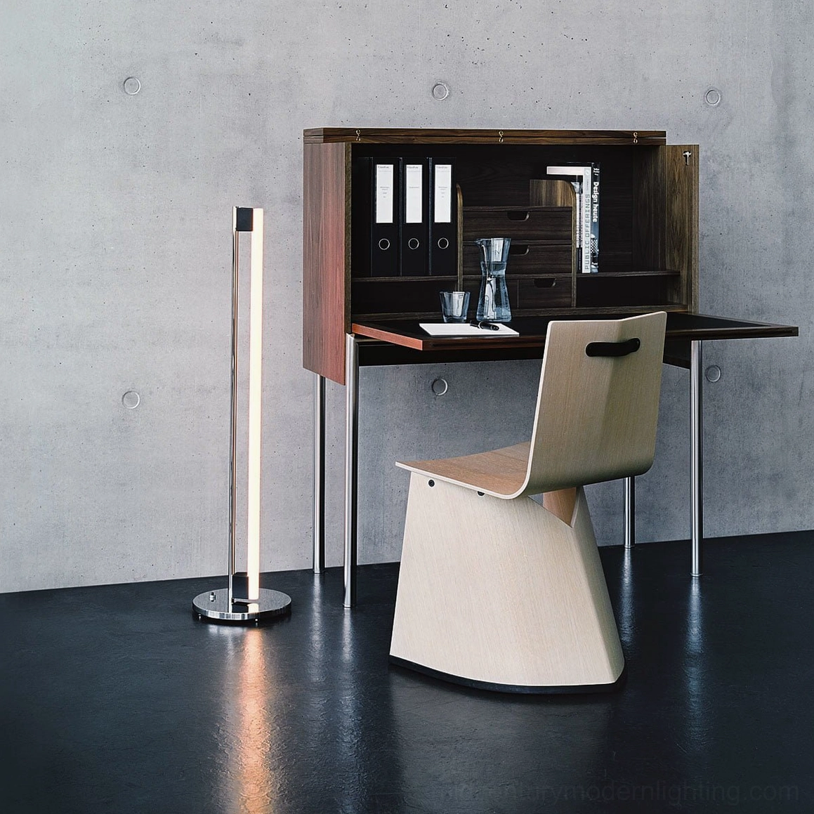 Modern minimalist tube LED floor lamp installed in Scandinavian-style interior with neutral color palette