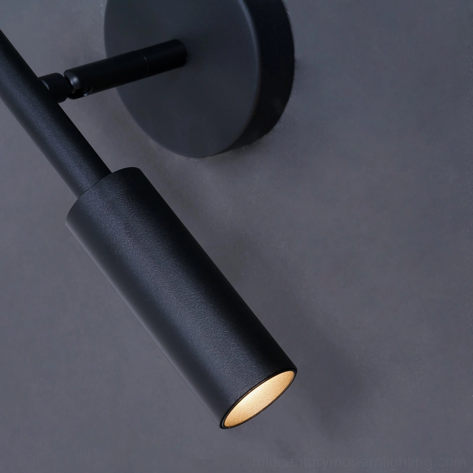Tubino minimalist wall light fixture adjustable beam directional illumination