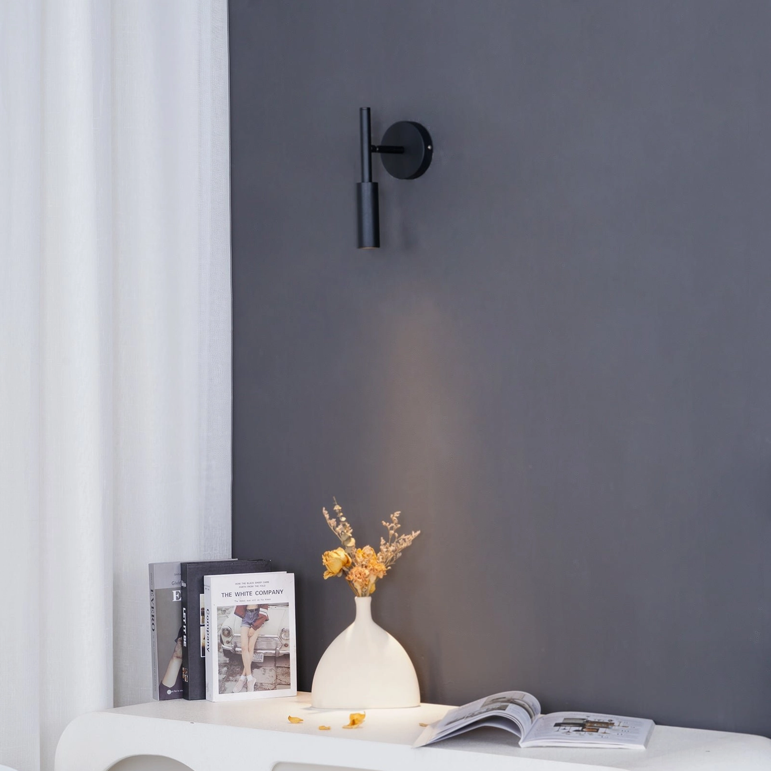 Tubino modern wall mounted lamp studio product shot rotatable head mechanism