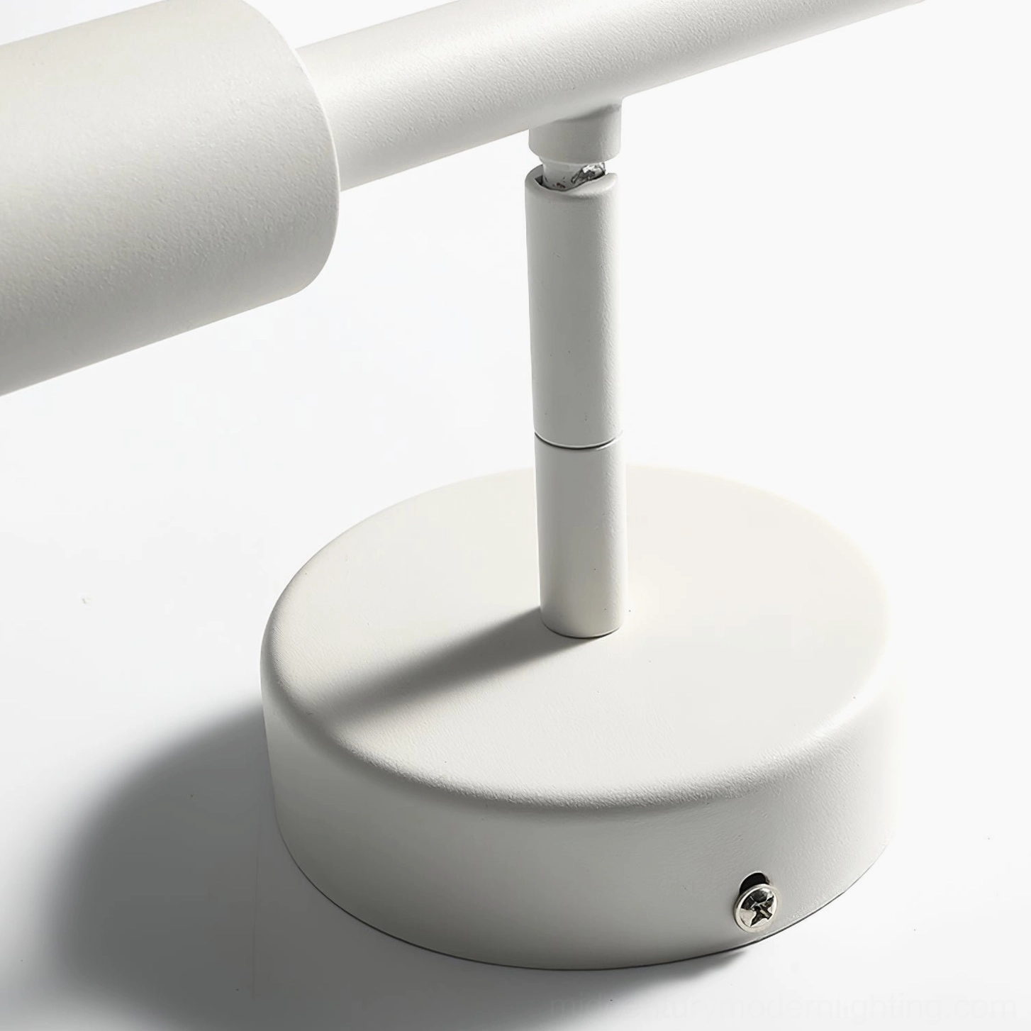 Tubino white wall lamp bottom detail rotatable joint hardware metal construction closeup