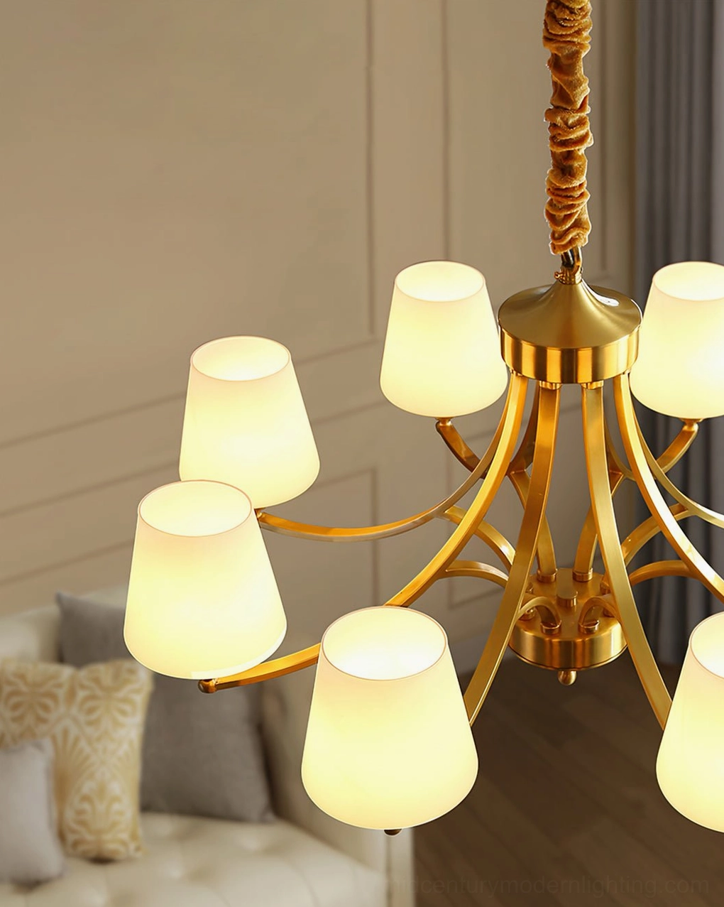 Mid-century modern brass chandelier pendant light showing suspension chain and fixture geometry