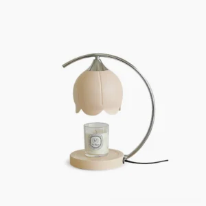Tulip floral candle warmer table lamp with pink petal shade on white background – mid-century modern design