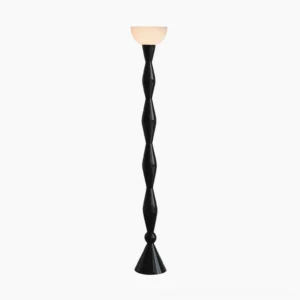 Twisted black torchiere floor lamp with white shade displayed on plain white studio background, mid-century modern design