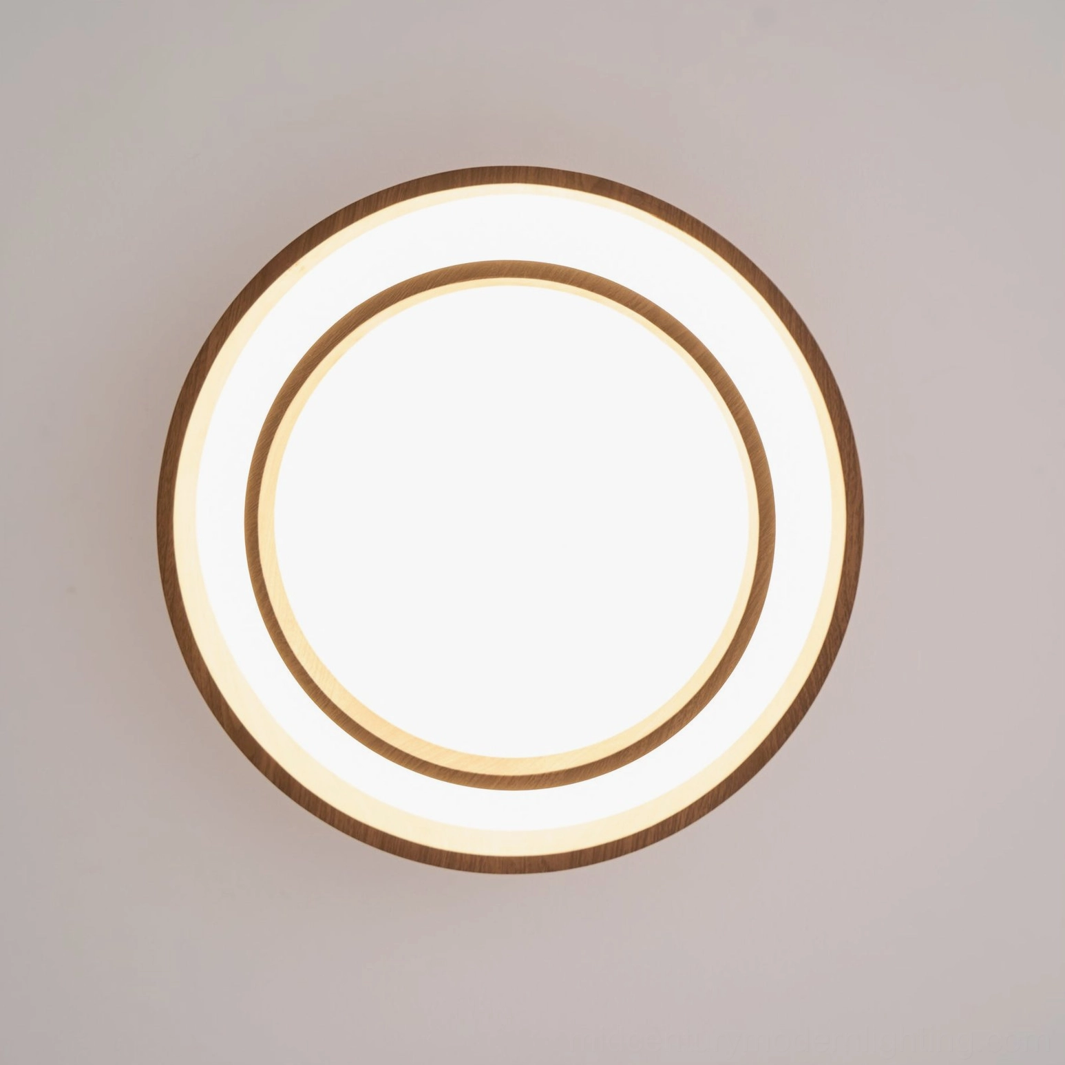 Vaako walnut ceiling lamp detail showing acrylic diffuser quality and integrated LED warm light output