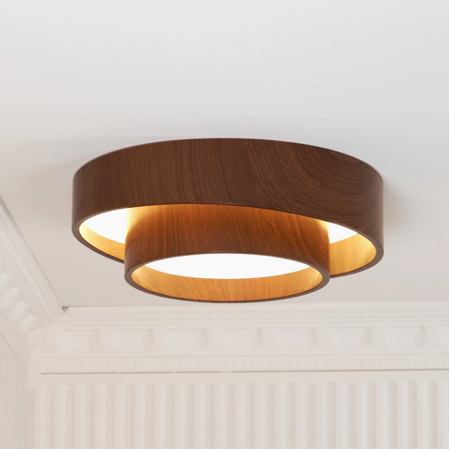 Vaako integrated LED ceiling lamp warm light pools across contemporary bedroom ceiling installation
