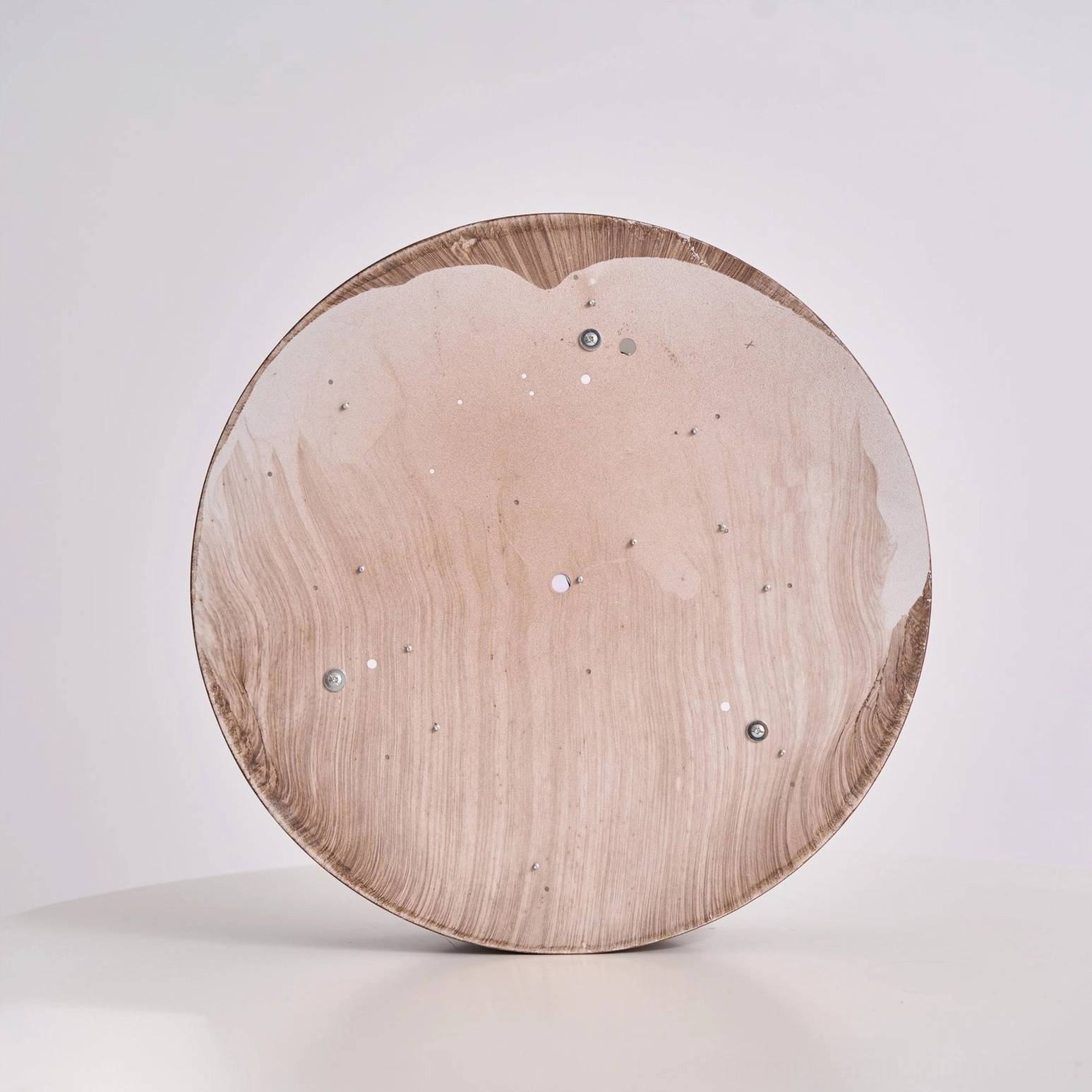Vaako ceiling light installation in contemporary living space with warm walnut grain finish accent