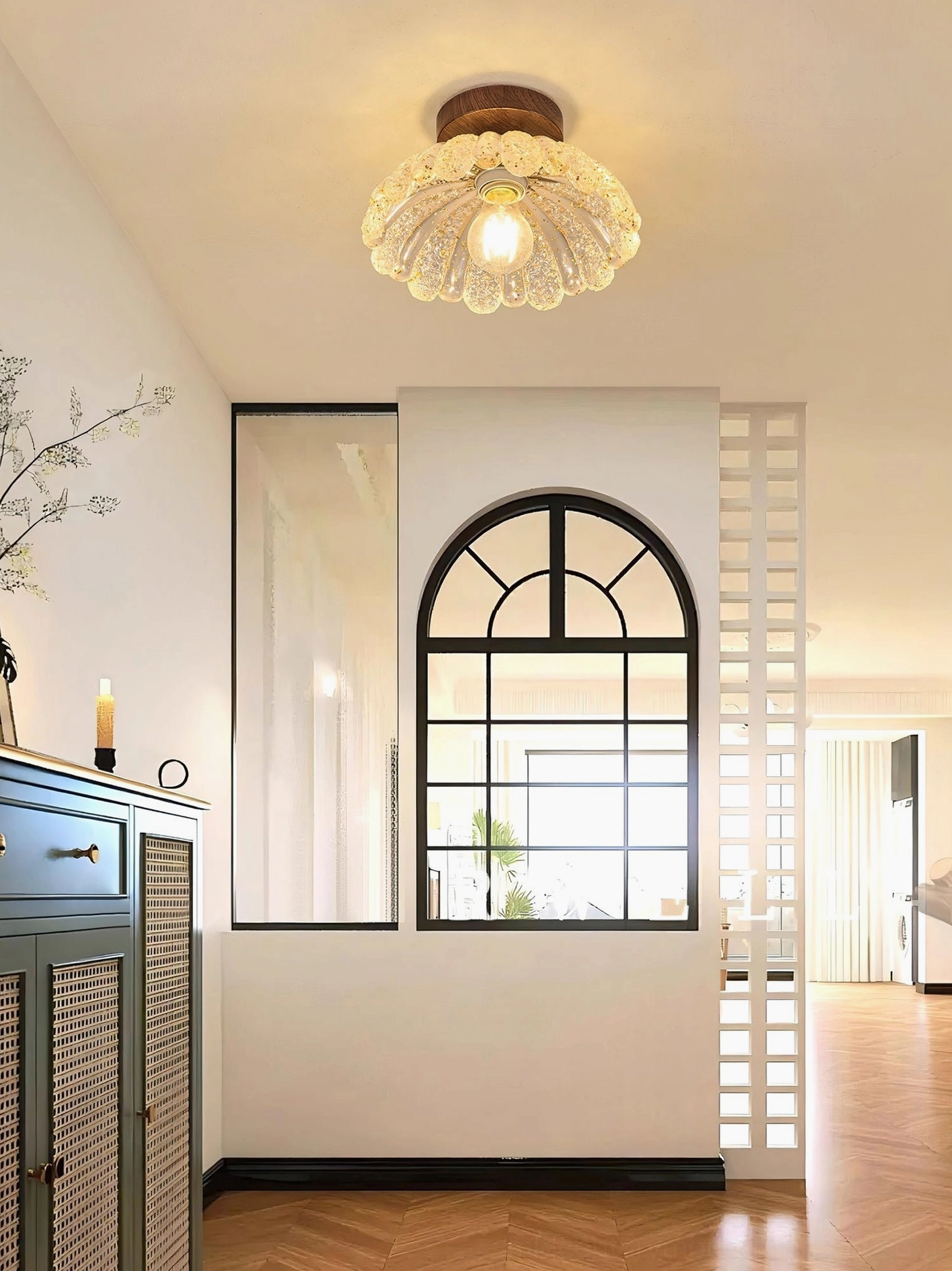 Vaczon mid-century modern flush mount in retro home with arched window and warm decor