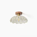 Vaczon scalloped glass flush mount ceiling light front view with walnut wood base on white background