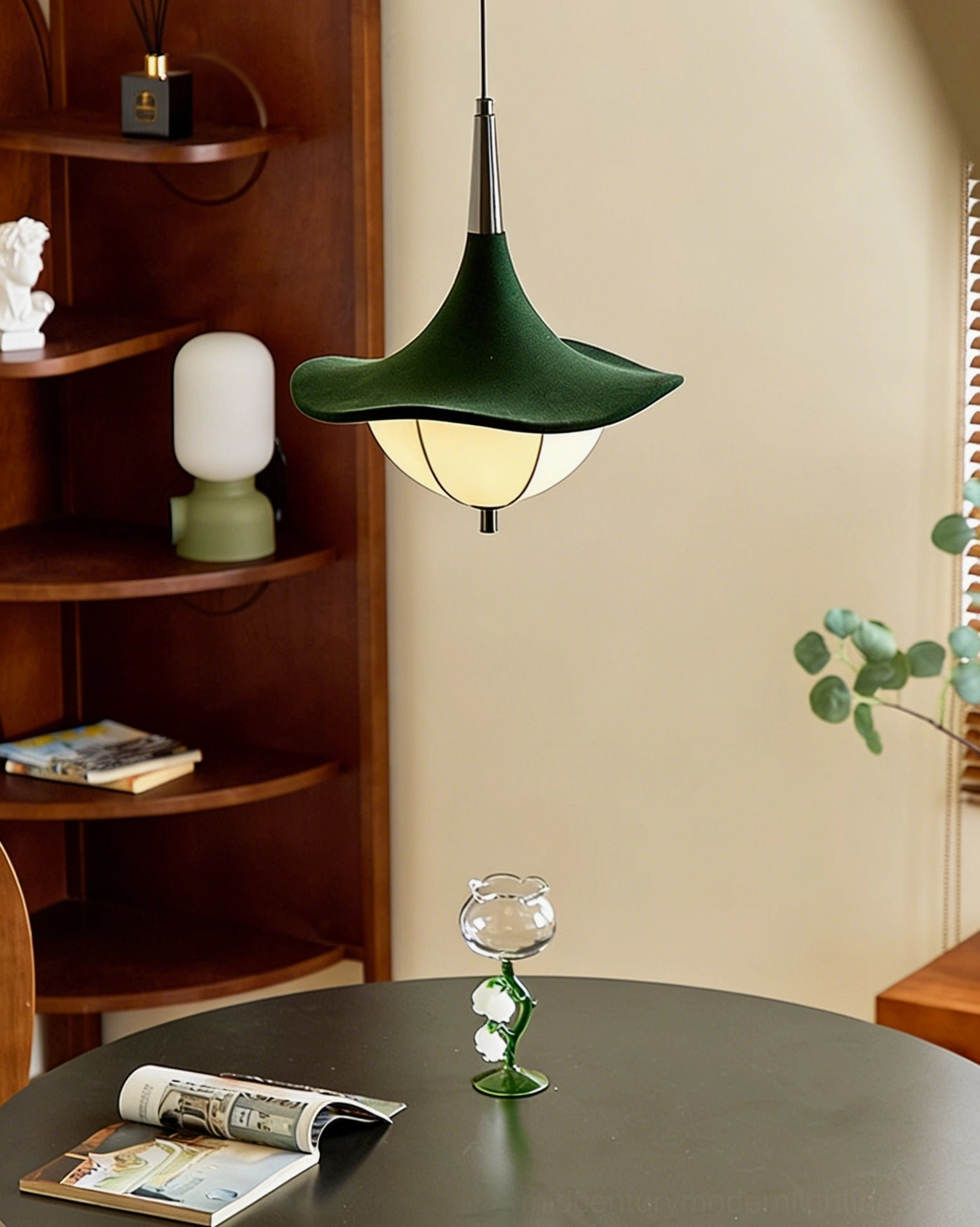 Vadar sculptural pendant fixture overhead view in vintage dining room with retro decor styling