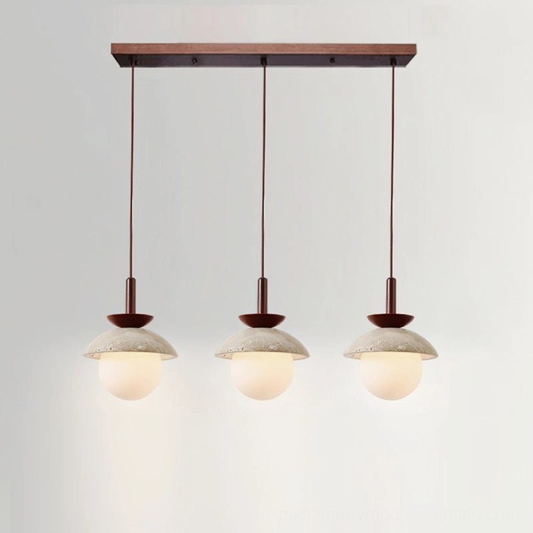 Valerie three-light pendant fixture in walnut wood and beige travertine as statement piece in modern dining area
