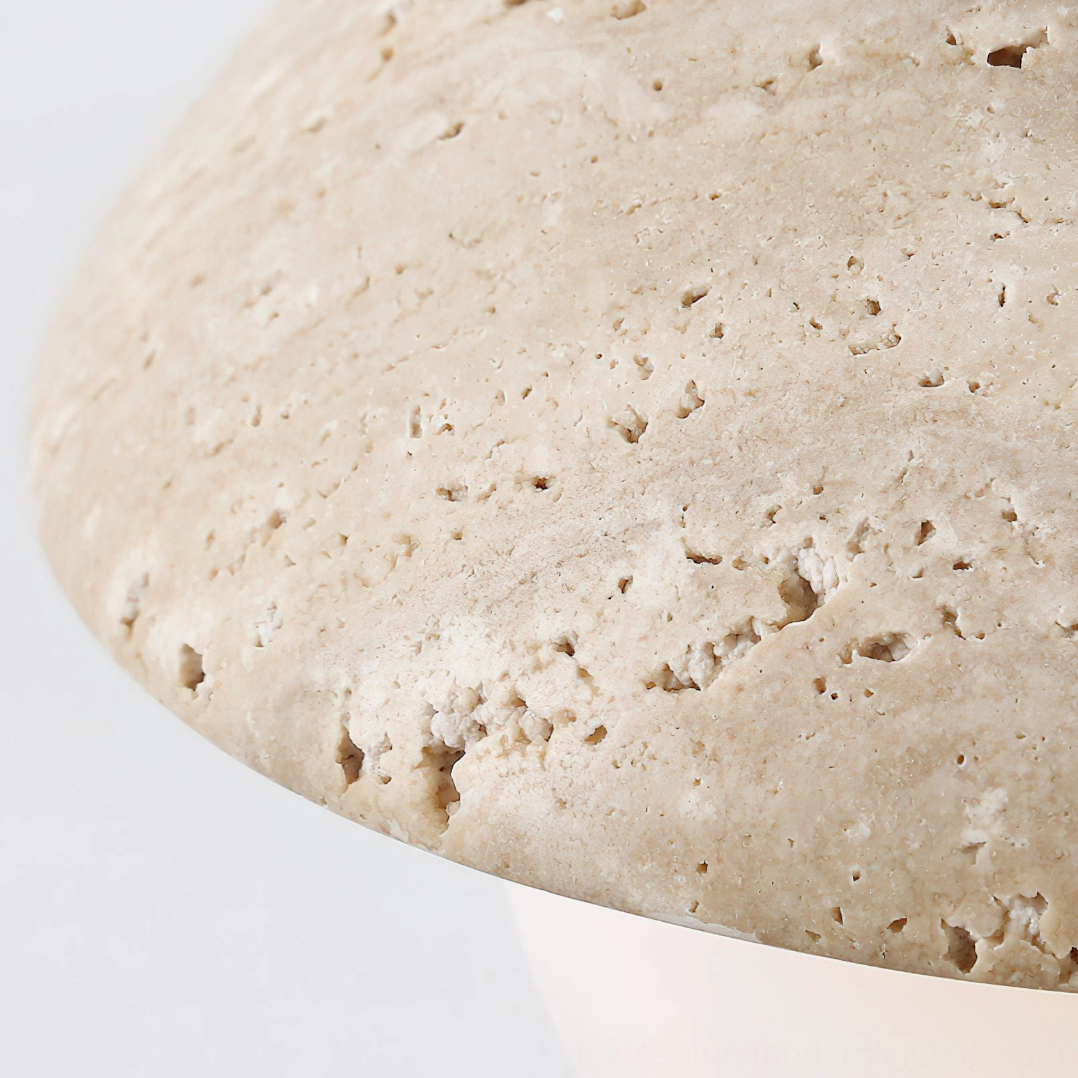 Macro close-up photography of natural travertine stone texture showing porous surface and organic veining detail