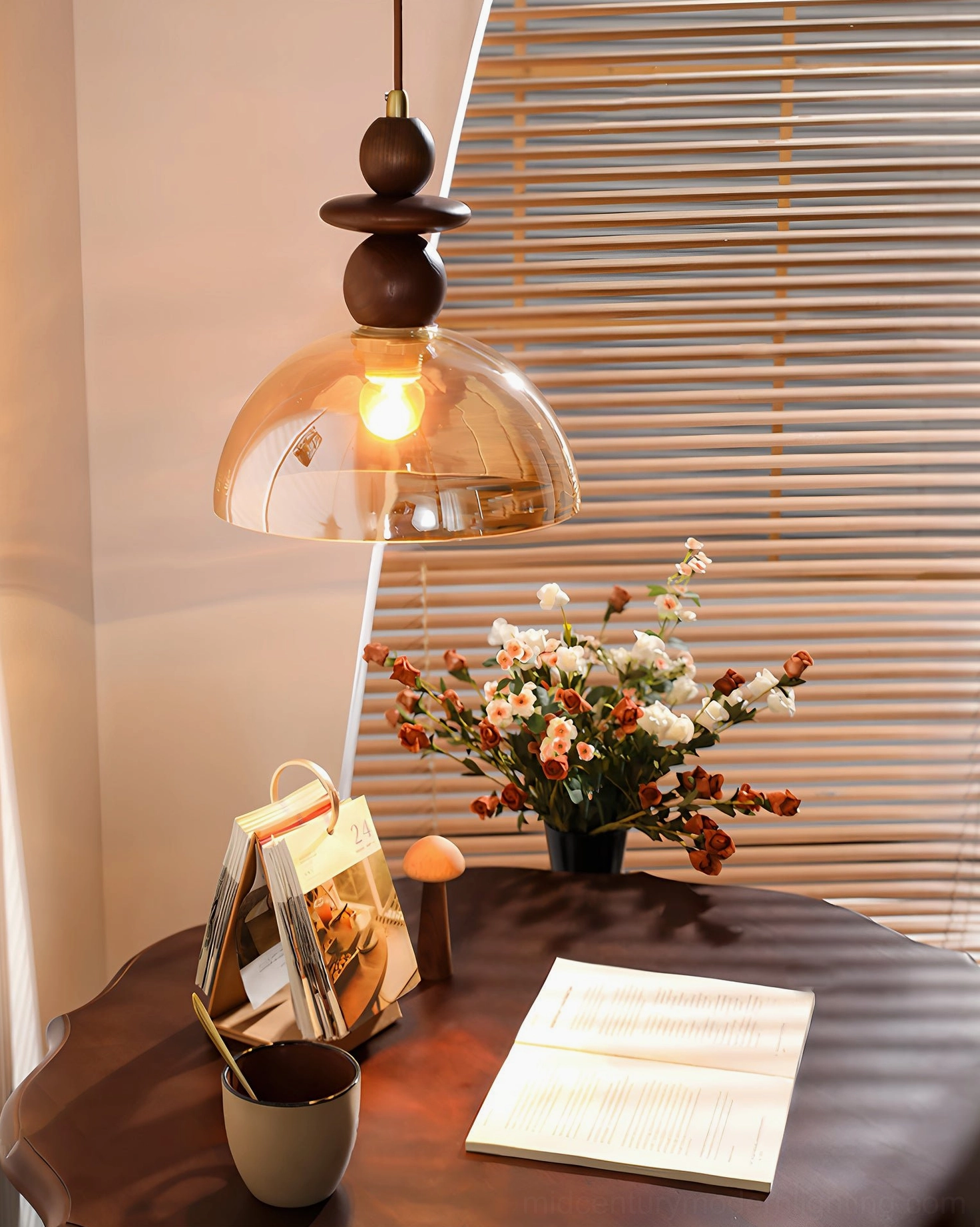 Valeska amber glass pendant light three-quarter view with walnut accents and vintage mid-century modern aesthetic