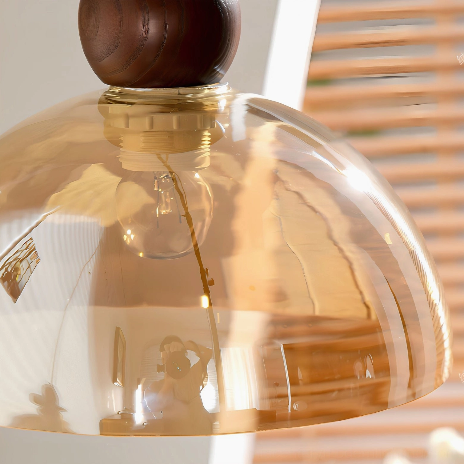 Valeska walnut and amber pendant light architectural detail showcasing mid-century design elements