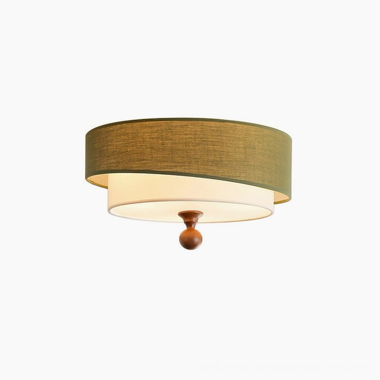 Vanelia dual-layer fabric flush mount ceiling lamp with olive green outer shade and cream inner diffuser, frontal close-up view showing woven linen texture and wooden spherical finial