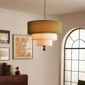 Vanelia pendant lamp hanging in vintage living room with arched window, green and white fabric shades creating warm ambient lighting in mid-century modern interior