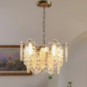 Illuminated Varvara glass chandelier creating soft romantic glow in modern living room with landscape wall art