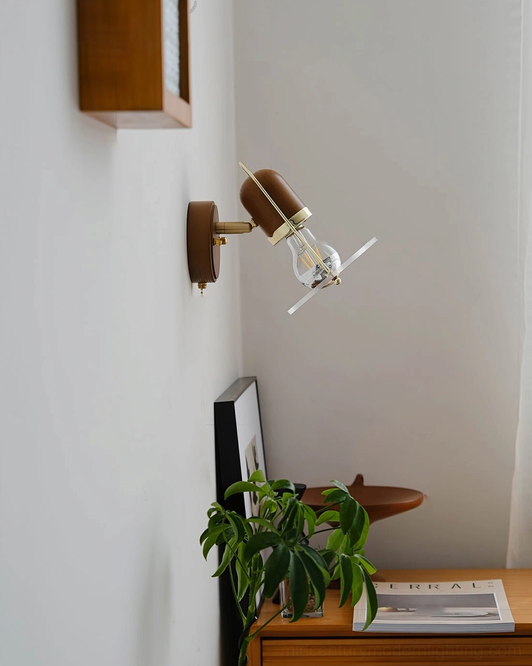 Vaughan wall-mounted sconce right oblique angle view showing adjustable arm and mounting bracket